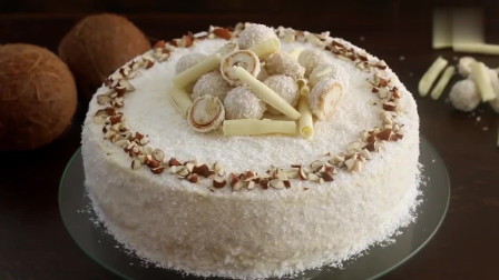 牛人制作的杏仁椰子蛋糕，满满的椰蓉，看着好满足