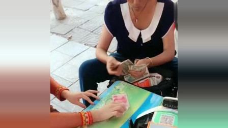 缅甸小姐姐想去换缅币,拿100元人民币换缅币