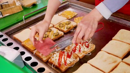 韩国一个三层豪华三明治，培根、鸡蛋、芝士应有尽有，吃一个包你长胖。