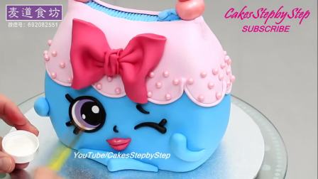 精致的翻糖装饰蛋糕,蓝色卡通娃娃包包造型蛋糕｜麦道食坊